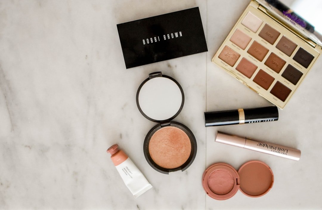 A serene makeup setup featuring high-quality beauty products and tools arranged elegantly on a vanity.