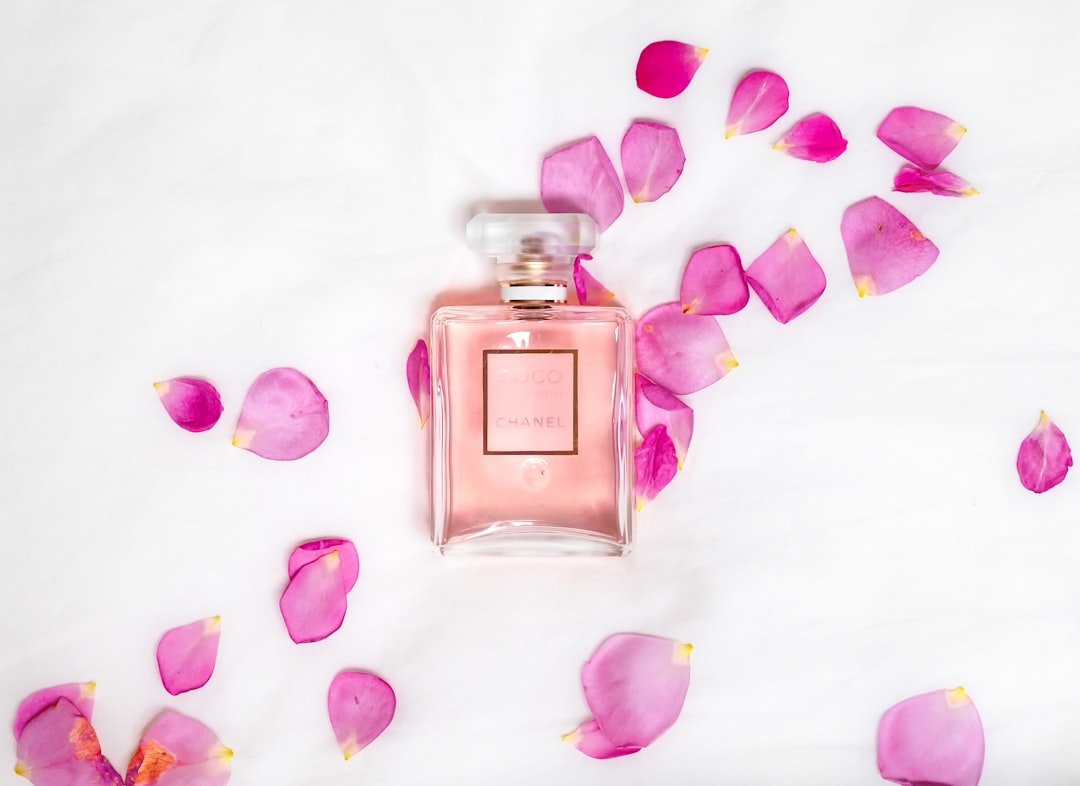 A close-up of a perfume bottle with a soft focus background, showcasing the elegance and allure of fragrance.