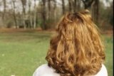 How to Reduce Dryness and Frizz Without Weighing Down Your Hair